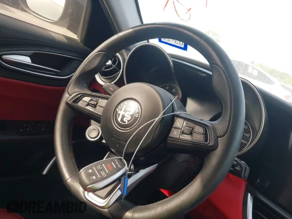 ✅ 2021 Alfa Romeo Giulia • VIN: ZARFAMAN6M7645490 • Лот: 42165037. Опубліковано раніше на IAAI з пробігом 57 701 миль. Безкоштовний доступ до архіву аукціонних продажів зі США та докладний звіт про історію автомобіля на DreamBid. Зображення 11.