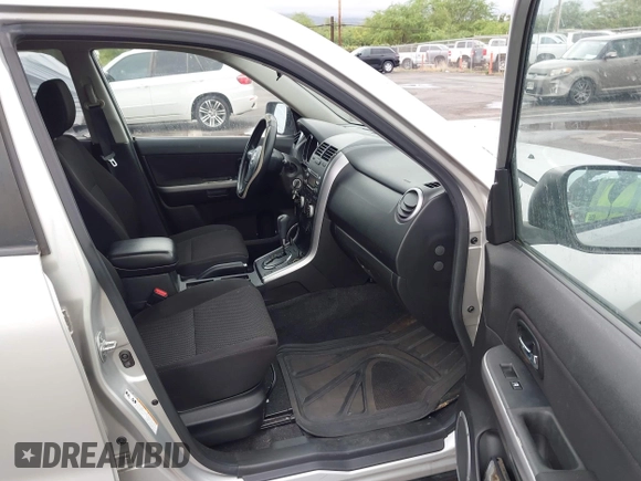 ✅ 2012 Suzuki Grand Vitara Premium • VIN: JS3TE0D26C4100872 • Lot: 44589020. Wystawiony na IAAI z przebiegiem 74 668 mil. Bezpłatny archiwum sprzedaży aukcyjnych z USA i szczegółowy raport historii pojazdu na DreamBid. Zdjęcie 5.
