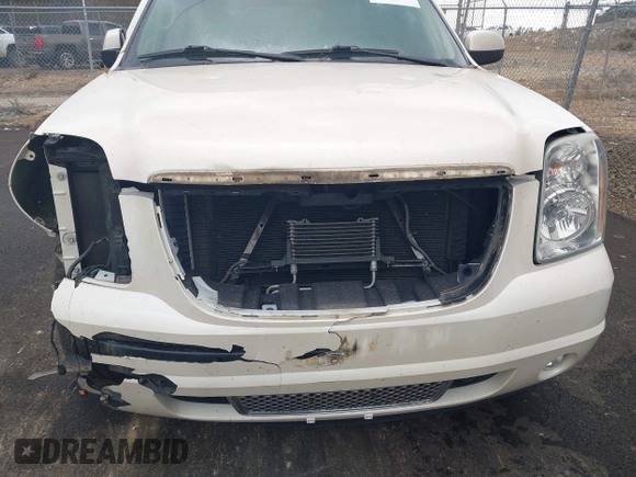 ✅ 2013 GMC Yukon Denali • VIN: 1GKS1EEF3DR334352 • Lot: 43950784. Wystawiony na IAAI z przebiegiem 127 335 mil. Bezpłatny archiwum sprzedaży aukcyjnych z USA i szczegółowy raport historii pojazdu na DreamBid. Zdjęcie 6.