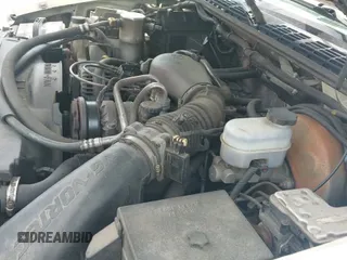 2003 Chevrolet Blazer LS z VIN 1GNCT18X83K143404, wystawiony jako IAAI lot #42572749 z przebiegiem 182 362 mil mil oraz . Historia ofert i sprzedaży dostępna na DreamBid. Obrazek 13.