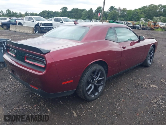 ✅ 2023 Dodge Challenger SXT • VIN: 2C3CDZAG8PH692908 • Lot: 43021671. Wystawiony na IAAI z przebiegiem 11 887 mil. Bezpłatny archiwum sprzedaży aukcyjnych z USA i szczegółowy raport historii pojazdu na DreamBid. Zdjęcie 4.