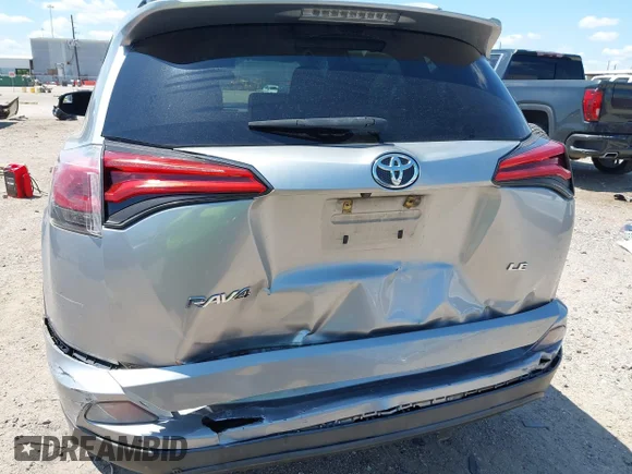 ✅ 2016 Toyota RAV4 LE • VIN: 2T3ZFREV9GW240801 • Lot: 45156577. Listed on IAAI with 99,502 mi. Free auction sales archive from the USA and detailed vehicle history report at DreamBid. Image 6.