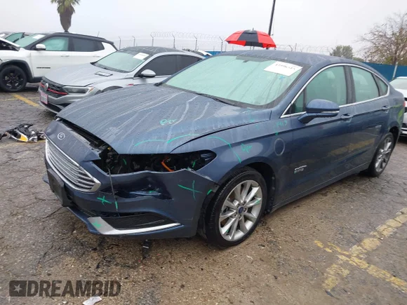 ✅ 2018 Ford Fusion SE • VIN: 3FA6P0PU1JR145246 • Lot: 43996515. Listed on IAAI with 131,293 mi. Free auction sales archive from the USA and detailed vehicle history report at DreamBid. Image 2.