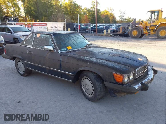✅ 1987 Mercedes-Benz 560 SL • VIN: WDBBA48D6HA056954 • Lot: 43389778. Wystawiony na IAAI z przebiegiem 128 734 mil. Bezpłatny archiwum sprzedaży aukcyjnych z USA i szczegółowy raport historii pojazdu na DreamBid. Zdjęcie 1.