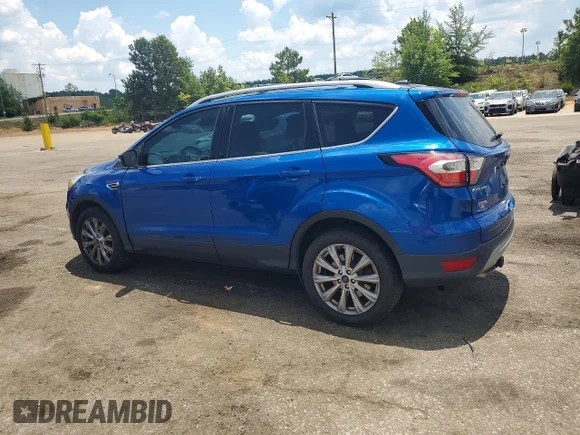 ✅ 2017 Ford Escape Titanium • VIN: 1FMCU0JD7HUC43033 • Lot: 57231346. Listed on Copart with 132,984 mi. Free auction sales archive from the USA and detailed vehicle history report at DreamBid. Image 2.