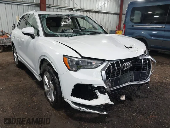 ✅ 2022 Audi Q3 Premium • VIN: WA1AUCF36N1001998 • Lot: 43414795. Wystawiony na IAAI z przebiegiem 61 671 mil. Bezpłatny archiwum sprzedaży aukcyjnych z USA i szczegółowy raport historii pojazdu na DreamBid. Zdjęcie 1.