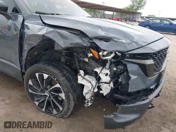✅ 2025 Mazda CX-50 Hybrid Premium Plus Package • VIN: 7MMVAAEW9SN114641 • Лот: 44954653. Опубліковано раніше на IAAI з пробігом 12 309 миль. Безкоштовний доступ до архіву аукціонних продажів зі США та докладний звіт про історію автомобіля на DreamBid. Зображення 6.