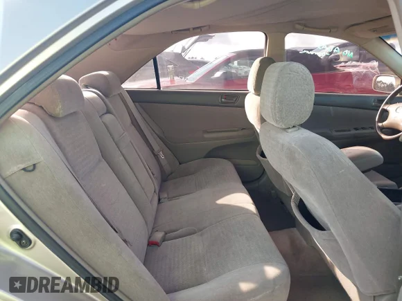 ✅ 2004 Toyota Camry LE • VIN: JTDBE32K540297668 • Lot: 43962551. Wystawiony na IAAI z przebiegiem 130 468 mil. Bezpłatny archiwum sprzedaży aukcyjnych z USA i szczegółowy raport historii pojazdu na DreamBid. Zdjęcie 8.