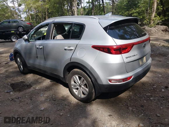 ✅ 2017 Kia Sportage LX • VIN: KNDPM3AC1H7211644 • Lot: 45390298. Listed on IAAI with 124,230 mi. Free auction sales archive from the USA and detailed vehicle history report at DreamBid. Image 3.