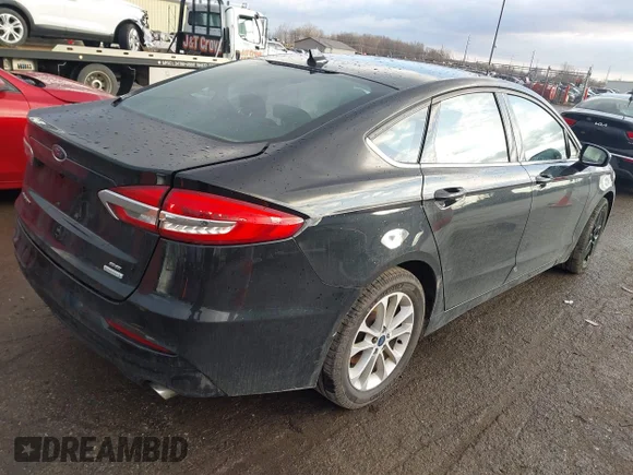 ✅ 2020 Ford Fusion SE • VIN: 3FA6P0HD1LR259541 • Lot: 44104828. Listed on IAAI with 79,659 mi. Free auction sales archive from the USA and detailed vehicle history report at DreamBid. Image 4.