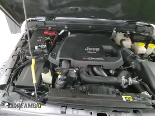 ✅ 2020 Jeep Wrangler Unlimited Sport • VIN: 1C4HJXDM7LW277445 • Lot: 82929714. Wystawiony na Copart z przebiegiem 27 570 mil. Bezpłatny archiwum sprzedaży aukcyjnych z USA i szczegółowy raport historii pojazdu na DreamBid. Zdjęcie 16.