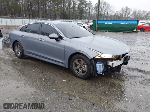✅ 2023 Kia K5 LXS • VIN: 5XXG14J25PG196786 • Лот: 41759020. Опубликован ранее на IAAI с пробегом 49 046 миль. Бесплатный доступ к архиву аукционных продаж из США и подробный отчёт об истории автомобиля на DreamBid. Изображение 1.