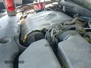 ✅ 2004 Cadillac DeVille • VIN: 1G6KD54Y34U211544 • Lot: 43101047. Listed on IAAI with 142,065 mi. Free auction sales archive from the USA and detailed vehicle history report at DreamBid. Image 13.