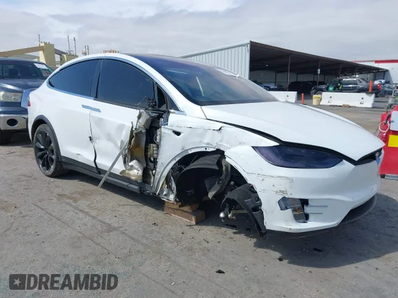 ✅ 2021 Tesla Model X Long Range Plus • VIN: 5YJXCBE23MF321243 • Lot: 42100580. Listed on IAAI with 59,878 mi. Free auction sales archive from the USA and detailed vehicle history report at DreamBid. Image 1.