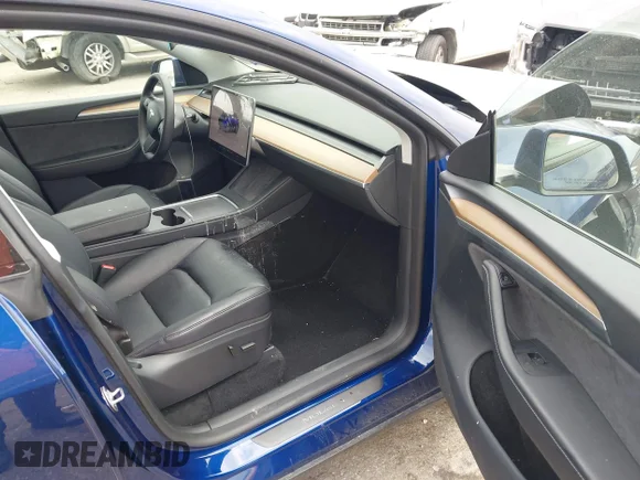 ✅ 2023 Tesla Model Y Long Range • VIN: 7SAYGDEE4PA179293 • Lot: 44946569. Wystawiony na IAAI z przebiegiem 33 999 mil. Bezpłatny archiwum sprzedaży aukcyjnych z USA i szczegółowy raport historii pojazdu na DreamBid. Zdjęcie 5.