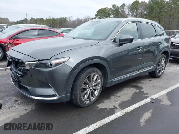 ✅ 2017 Mazda CX-9 Grand Touring • VIN: JM3TCBDY6H0132831 • Лот: 44300051. Опубліковано раніше на IAAI з пробігом 88 966 миль. Безкоштовний доступ до архіву аукціонних продажів зі США та докладний звіт про історію автомобіля на DreamBid. Зображення 2.