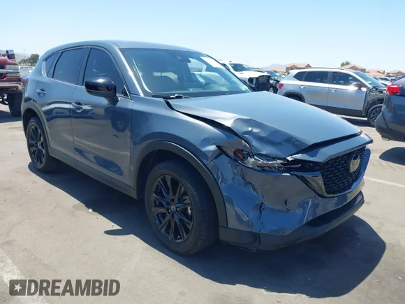 ✅ 2023 Mazda CX-5 S Carbon Edition • VIN: JM3KFBCM0P0101462 • Лот: 45044327. Опубликован ранее на IAAI с пробегом 24 051 миль. Бесплатный доступ к архиву аукционных продаж из США и подробный отчёт об истории автомобиля на DreamBid. Изображение 1.