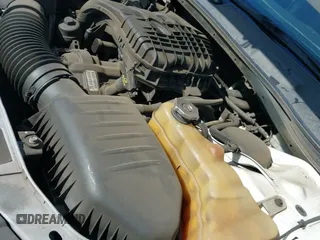 ✅ 2013 Dodge Challenger SXT • VIN: 2C3CDYAG3DH573945 • Lot: 41443472. Wystawiony na IAAI z przebiegiem 149 823 mil. Bezpłatny archiwum sprzedaży aukcyjnych z USA i szczegółowy raport historii pojazdu na DreamBid. Zdjęcie 19.