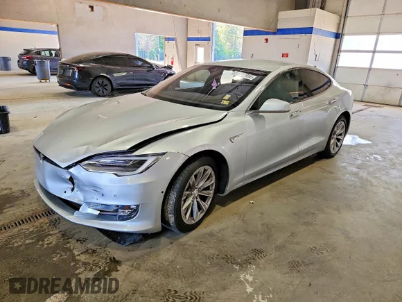 ✅ 2016 Tesla Model S 70 • VIN: 5YJSA1E13GF158504 • Lot: 51823856. Listed on Copart with 109,986 mi. Free auction sales archive from the USA and detailed vehicle history report at DreamBid. Image 1.