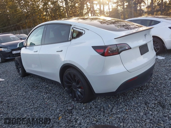 ✅ 2023 Tesla Model Y Performance • VIN: 7SAYGDEF8PF663950 • Лот: 40705673. Опубликован ранее на IAAI с пробегом 24 961 миль. Бесплатный доступ к архиву аукционных продаж из США и подробный отчёт об истории автомобиля на DreamBid. Изображение 3.