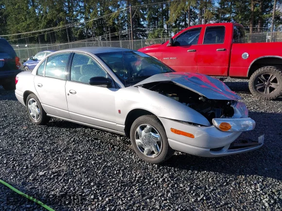 ✅ 2001 Saturn SL • VIN: 1G8ZK52761Z212627 • Lot: 43873628. Listed on IAAI with 98,172 mi. Free auction sales archive from the USA and detailed vehicle history report at DreamBid. Image 1.
