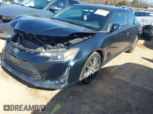 ✅ 2016 Scion tC • VIN: JTKJF5C79GJ018065 • Lot: 41516834. Wystawiony na IAAI z przebiegiem 75 926 mil. Bezpłatny archiwum sprzedaży aukcyjnych z USA i szczegółowy raport historii pojazdu na DreamBid. Zdjęcie 2.
