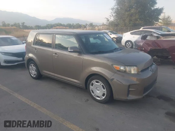 ✅ 2012 Scion xB Release Series 9.0 • VIN: JTLZE4FE0CJ004927 • Лот: 45631169. Опубликован ранее на IAAI с пробегом 147 759 миль. Бесплатный доступ к архиву аукционных продаж из США и подробный отчёт об истории автомобиля на DreamBid. Изображение 1.