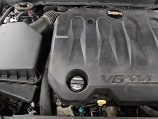 2019 Chevrolet Impala LT z VIN 2G11Z5S35K9151853, wystawiony jako Copart lot #89635985 z przebiegiem 108 313 mil mil oraz Czysty tytuł • Clean title. Historia ofert i sprzedaży dostępna na DreamBid. Obrazek 14.