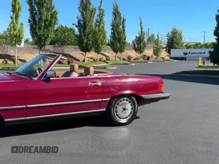 ✅ 1986 Mercedes-Benz 560 SL • VIN: WDBBA48D9GA054940 • Lot: 66776975. Listed on Copart with 83,187 mi. Free auction sales archive from the USA and detailed vehicle history report at DreamBid. Image 12.