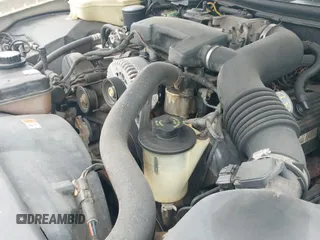 ✅ 2001 Lincoln Town Car Cartier • VIN: 1LNHM83W71Y629856 • Лот: 42821533. Опубликован ранее на IAAI с пробегом 163 204 миль. Бесплатный доступ к архиву аукционных продаж из США и подробный отчёт об истории автомобиля на DreamBid. Изображение 14.