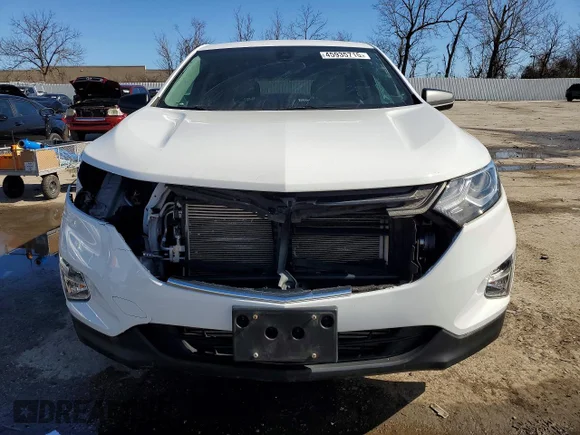 ✅ 2021 Chevrolet Equinox LS • VIN: 2GNAX5EV0M6156870 • Lot: 45935716. Wystawiony na Copart z przebiegiem 52 987 mil. Bezpłatny archiwum sprzedaży aukcyjnych z USA i szczegółowy raport historii pojazdu na DreamBid. Zdjęcie 5.