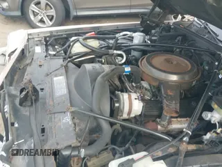 ✅ 1991 Cadillac Brougham • VIN: 1G6DW5478MR722700 • Lot: 43602182. Wystawiony na IAAI z przebiegiem 99 799 mil. Bezpłatny archiwum sprzedaży aukcyjnych z USA i szczegółowy raport historii pojazdu na DreamBid. Zdjęcie 12.