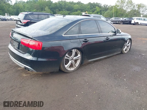 ✅ 2014 Audi S6 Prestige • VIN: WAUF2AFC5EN088014 • Лот: 42987449. Опубликован ранее на IAAI с пробегом 129 781 миль. Бесплатный доступ к архиву аукционных продаж из США и подробный отчёт об истории автомобиля на DreamBid. Изображение 4.