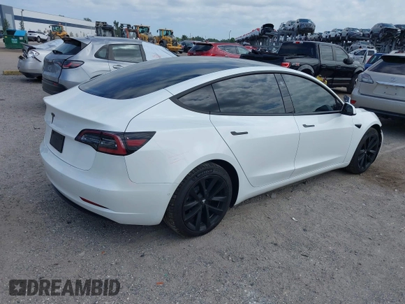 ✅ 2021 Tesla Model 3 Long Range • VIN: 5YJ3E1EB1MF990436 • Lot: 45013587. Listed on IAAI with 58,156 mi. Free auction sales archive from the USA and detailed vehicle history report at DreamBid. Image 4.