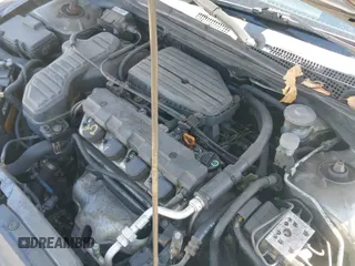 ✅ 2005 Honda Civic EX • VIN: 1HGEM21905L050732 • Lot: 41879611. Listed on IAAI with 252,311 mi. Free auction sales archive from the USA and detailed vehicle history report at DreamBid. Image 19.