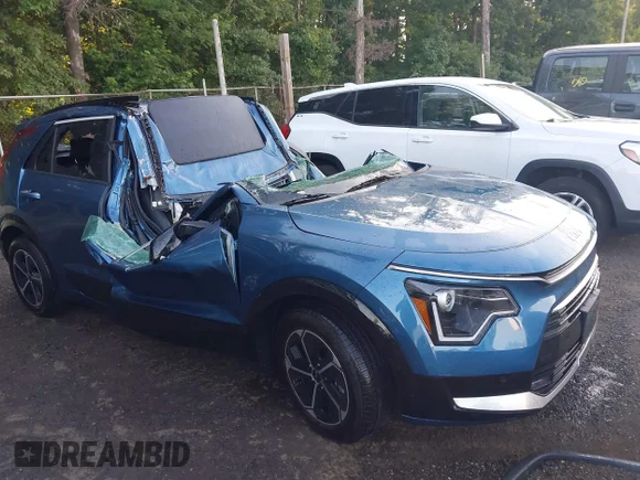 ✅ 2025 Kia Niro SX • VIN: KNDCT3LEXS5267701 • Лот: 42577037. Опубликован ранее на IAAI с пробегом Не указан. Бесплатный доступ к архиву аукционных продаж из США и подробный отчёт об истории автомобиля на DreamBid. Изображение 1.