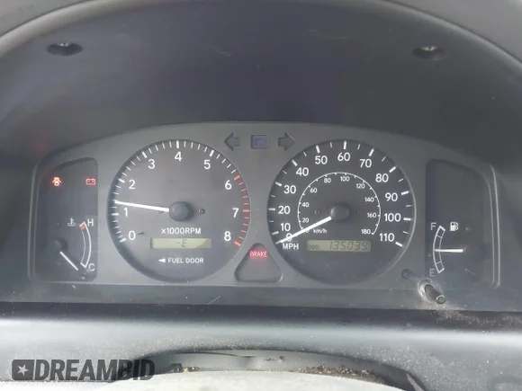 ✅ 1999 Toyota Corolla CE • VIN: 1NXBR12E9XZ176444 • Lot: 43916166. Wystawiony na IAAI z przebiegiem 135 039 mil. Bezpłatny archiwum sprzedaży aukcyjnych z USA i szczegółowy raport historii pojazdu na DreamBid. Zdjęcie 7.
