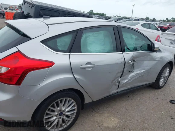 ✅ 2014 Ford Focus Titanium • VIN: 1FADP3N26EL354660 • Лот: 44835830. Опубліковано раніше на IAAI з пробігом 99 904 миль. Безкоштовний доступ до архіву аукціонних продажів зі США та докладний звіт про історію автомобіля на DreamBid. Зображення 6.