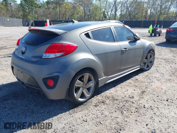 ✅ 2015 Hyundai Veloster Turbo • VIN: KMHTC6AE4FU243079 • Лот: 44597965. Опубліковано раніше на IAAI з пробігом 68 633 миль. Безкоштовний доступ до архіву аукціонних продажів зі США та докладний звіт про історію автомобіля на DreamBid. Зображення 4.