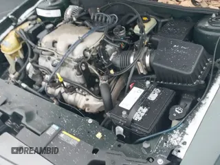 2003 Chevrolet Malibu z VIN 1G1ND52J13M571127, wystawiony jako IAAI lot #41310875 z przebiegiem 137 851 mil mil oraz . Historia ofert i sprzedaży dostępna na DreamBid. Obrazek 19.