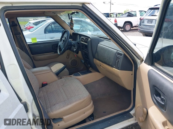 ✅ 1999 Jeep Cherokee SE • VIN: 1J4FT28S7XL678279 • Lot: 42257359. Wystawiony na IAAI z przebiegiem 148 540 mil. Bezpłatny archiwum sprzedaży aukcyjnych z USA i szczegółowy raport historii pojazdu na DreamBid. Zdjęcie 5.