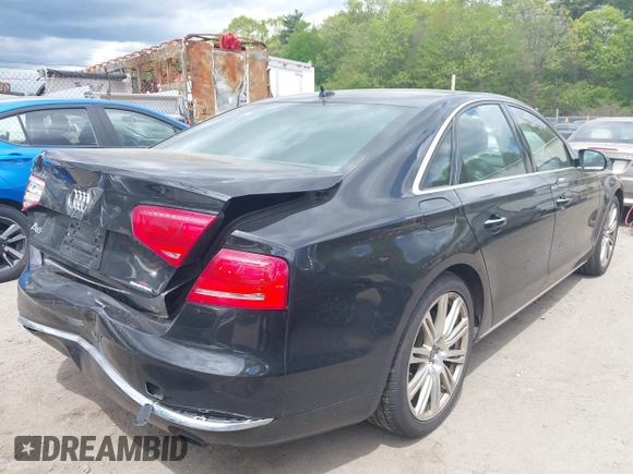 ✅ 2014 Audi A8 3.0T • VIN: WAUAGAFDXEN009974 • Lot: 42182155. Wystawiony na IAAI z przebiegiem 118 930 mil. Bezpłatny archiwum sprzedaży aukcyjnych z USA i szczegółowy raport historii pojazdu na DreamBid. Zdjęcie 4.