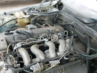 ✅ 1986 Mercedes-Benz 190 • VIN: WDBDB26D4GF207594 • Lot: 42622194. Wystawiony na IAAI z przebiegiem 189 910 mil. Bezpłatny archiwum sprzedaży aukcyjnych z USA i szczegółowy raport historii pojazdu na DreamBid. Zdjęcie 18.