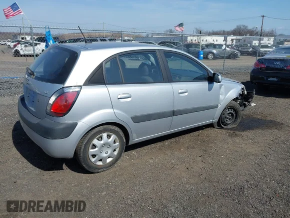 ✅ 2009 Kia Rio SX • VIN: KNADE243X96517588 • Лот: 41794810. Опубліковано раніше на IAAI з пробігом 109 474 миль. Безкоштовний доступ до архіву аукціонних продажів зі США та докладний звіт про історію автомобіля на DreamBid. Зображення 4.