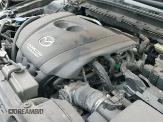 ✅ 2016 Mazda 3 i Touring • VIN: 3MZBM1V7XGM248690 • Лот: 43274646. Опубликован ранее на IAAI с пробегом 86 487 миль. Бесплатный доступ к архиву аукционных продаж из США и подробный отчёт об истории автомобиля на DreamBid. Изображение 19.