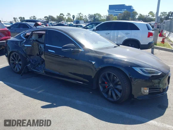✅ 2017 Tesla Model S 100D • VIN: 5YJSA1E43HF213285 • Lot: 44470761. Listed on IAAI with 126,644 mi. Free auction sales archive from the USA and detailed vehicle history report at DreamBid. Image 1.