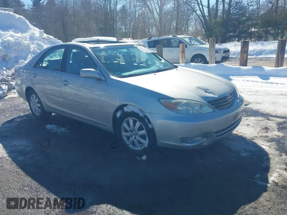 ✅ 2004 Toyota Camry LE • VIN: 4T1BF30K04U573453 • Лот: 44505336. Опубліковано раніше на IAAI з пробігом 98 814 миль. Безкоштовний доступ до архіву аукціонних продажів зі США та докладний звіт про історію автомобіля на DreamBid. Зображення 1.