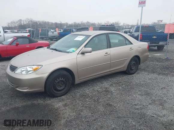 ✅ 2002 Toyota Camry LE • VIN: 4T1BE32K42U094742 • Lot: 44062421. Wystawiony na IAAI z przebiegiem 203 057 mil. Bezpłatny archiwum sprzedaży aukcyjnych z USA i szczegółowy raport historii pojazdu na DreamBid. Zdjęcie 2.