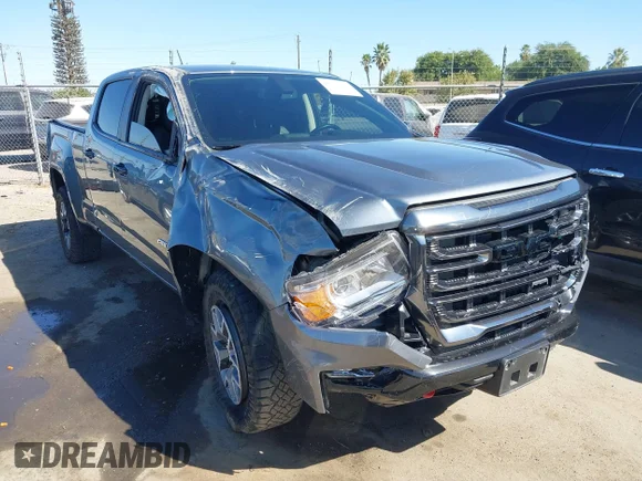 ✅ 2022 GMC Canyon 4WD AT4 • VIN: 1GTG6FEN5N1230204 • Lot: 43030780. Listed on IAAI with 30,524 mi. Free auction sales archive from the USA and detailed vehicle history report at DreamBid. Image 1.