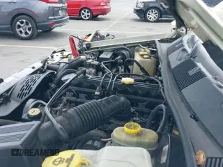 ✅ 1996 Jeep Grand Cherokee Laredo • VIN: 1J4FX58S5TC388512 • Lot: 42803796. Wystawiony na IAAI z przebiegiem 147 732 mil. Bezpłatny archiwum sprzedaży aukcyjnych z USA i szczegółowy raport historii pojazdu na DreamBid. Zdjęcie 12.